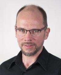 Dr. Marcus Buker